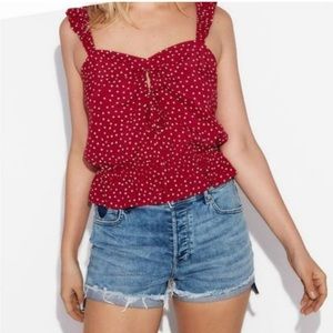 Red and White Polka Dot Tank Top from EXPRESS in the size Small